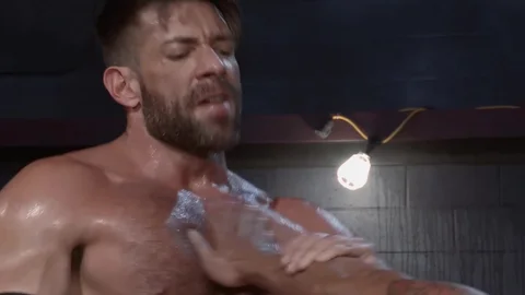 Raging Stallion - Wearing boots loves caged