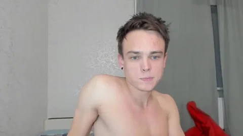 handsome young chap With Blue Eyes Stroking His cock In webcam